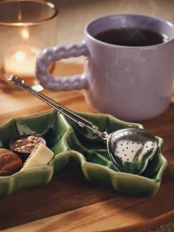 Søstrene Grene Tesi